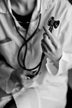 A stethoscope in the hands Stock Photos