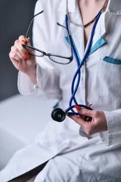 A stethoscope in the hands Stock Photos