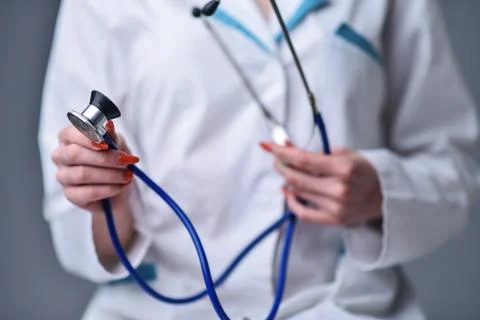 A stethoscope in the hands Stock Photos