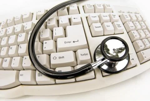 Stethoscope on keyboard Foto stock