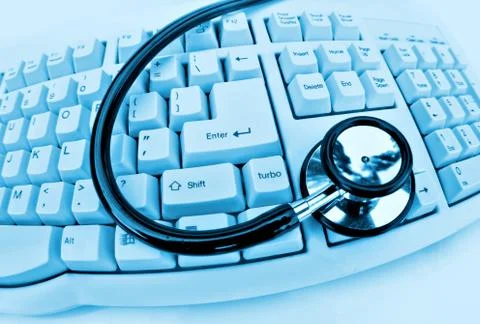 Stethoscope on keyboard Stock Photos
