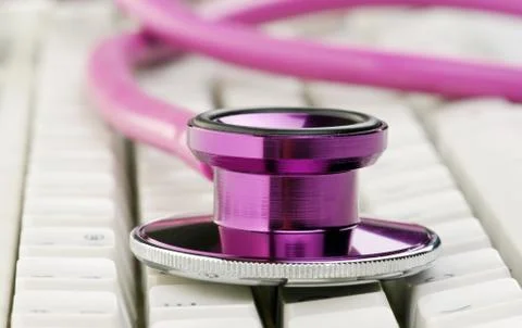 Stethoscope on keyboard Stock Photos