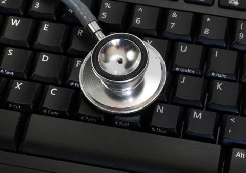 Stethoscope on keyboard Stock Photos