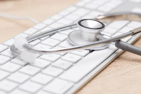 Stethoscope on keyboard Stock Photos