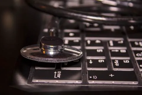 Stethoscope on keyboard Stock Photos