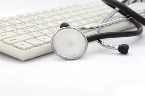 Stethoscope on the keyboard Stock Photos