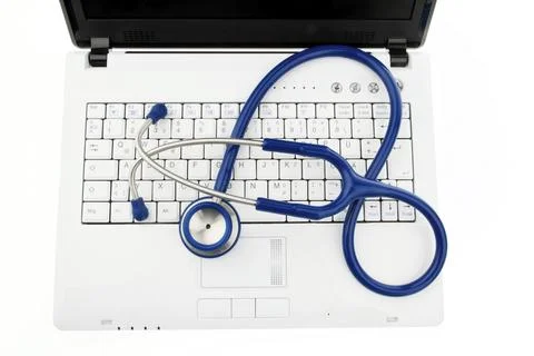 Stethoscope on laptop computer. Security for data on the Internet Austria Fotos de archivo