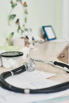 Stethoscope lying on table Stock Photos