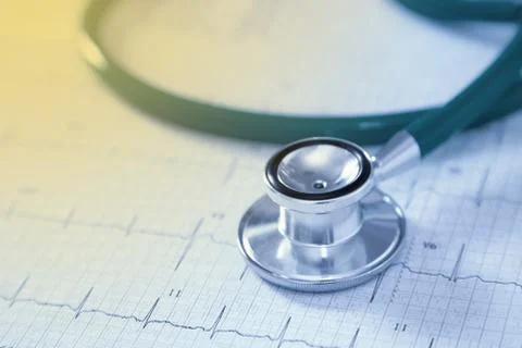 Stethoscope on physical graph paper Stock Photos