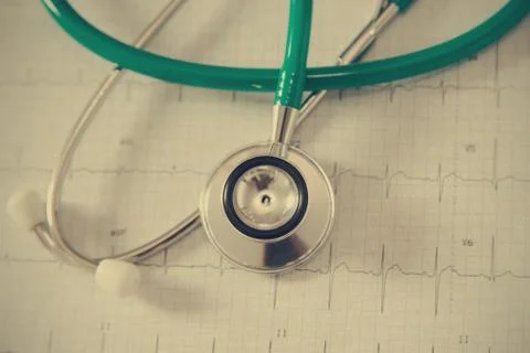 Stethoscope on physical graph paper Stock Photos