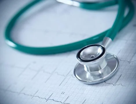 Stethoscope on physical graph paper Stock Photos
