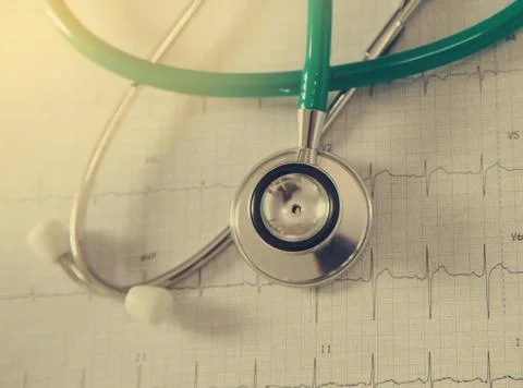Stethoscope on physical graph paper Stock Photos