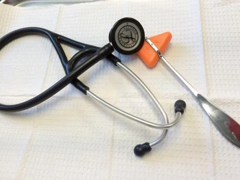 Stethoscope rubber reflex hammer on white background Stock Photos