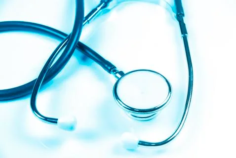 Stethoscope with space for note or text on old paper background Stock Photos