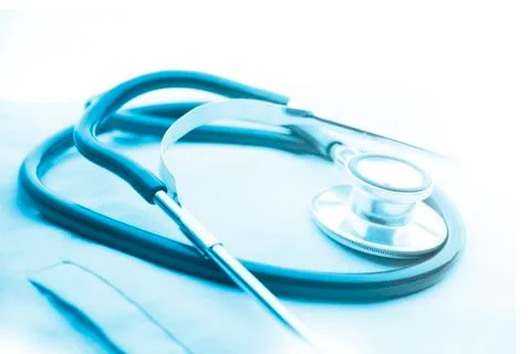 Stethoscope with space for note or text on old paper background Stock Photos