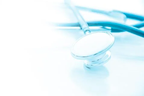 Stethoscope with space for note or text on old paper background Stock Photos