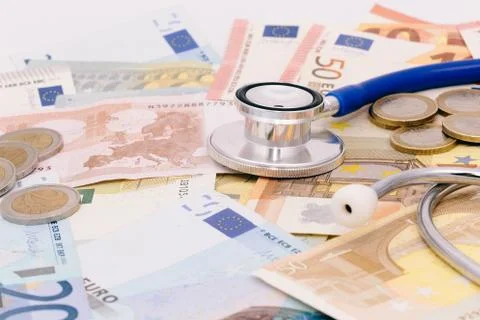 Stethoscope on a stack of euro bank notes Foto stock