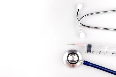 Stethoscope with syringe Stock Photos