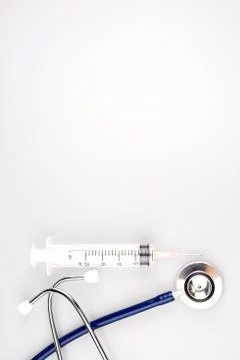 Stethoscope with syringe Stock Photos