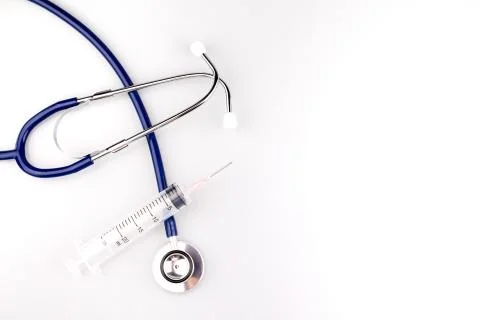 Stethoscope with syringe Stock Photos