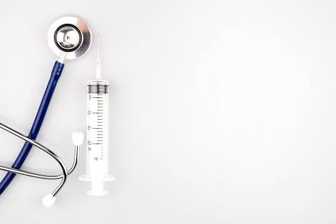 Stethoscope with syringe Stock Photos