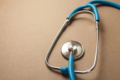 Stethoscope on a white table. Stock Photos