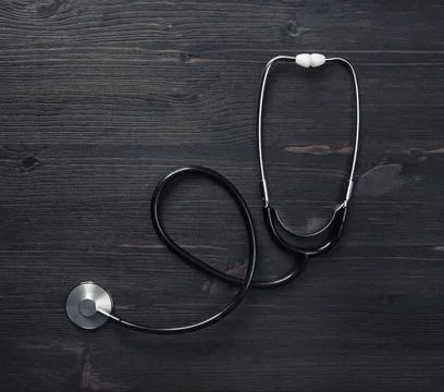 Stethoscope on wood table Stock Photos