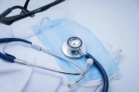 Stethoscopes on a blue mask  a Stock Photos