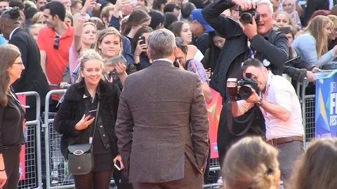 Steve Carell posing for paparazzi photographers at BFI London Film Festival 2018 Video stock 101190811