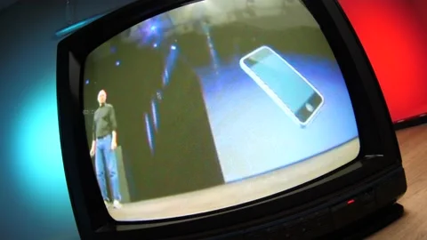 Steve Jobs Presenting the Original Iphone on a Old CRT TV Stock Footage