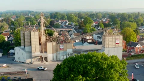 Stevens Feed Mill in small town America. Rural grain elevator for animal Stock Footage 155297675