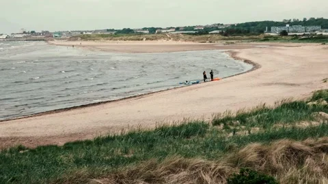 Stevenson Shoreline two men with small dinghays 動画素材 131731258
