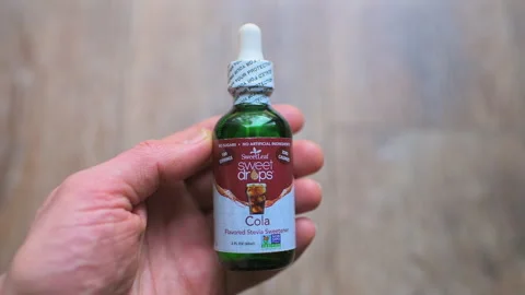 Stevia liquid drops in glass bottle sweetener sugar substitute SweetLeaf company Stock Footage 336783042