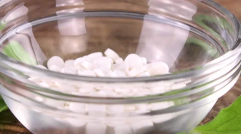 Stevia pills (seamless loopable; 4K) Stock Footage 64216243
