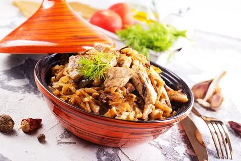 Stew cabbage with fried meat Stock Photos