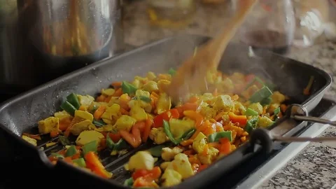 Stew cooking in the kitchen at home Stock Footage 72184818