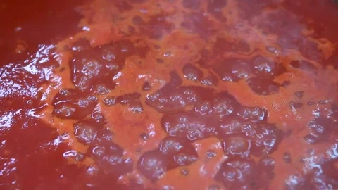Stew red tomato sauce close-up. hot sauce of red tomatoes. Stock Footage 162065233