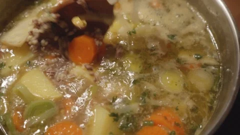 Stew with vegetables and meat cooks in a pot 2 Stock Footage 120033460