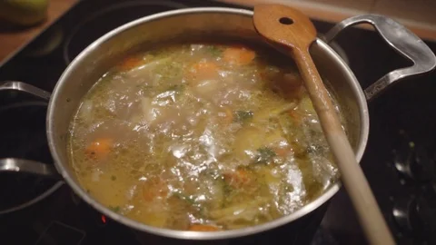 Stew with vegetables and meat cooks in a pot 3 Stock Footage 120033474