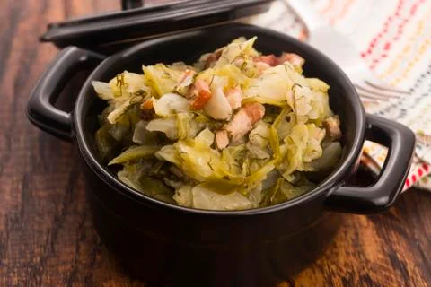 Stew of white cabbage and bacon Stock Photos