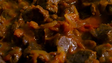 Stew in your own juice and fried onions and tomatoes Stock Footage 60072453