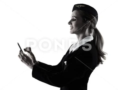 Stewardess cabin crew woman on the phone isolated silhouette Stock Photos