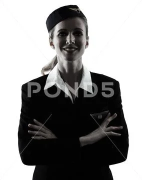 Stewardess cabin crew woman standing silhouette Stock Photos