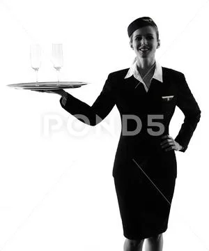 Stewardess cabin crew woman standing isolated silhouette Stock Photos