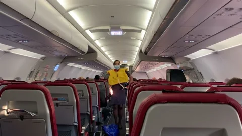 Stewardess explains how to use a life jacket Video stock 139745590