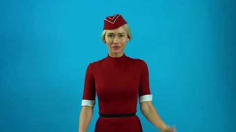 The stewardess shows emergency exit Stock Footage 93822644
