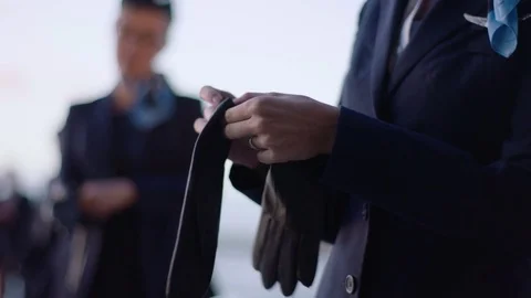 Stewards putting on gloves Stock Footage 70462570