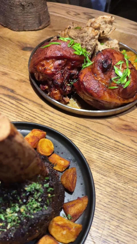 Stewed beef on the bone Eating traditional Spanish soup with oxtail in Stock Footage 322663457
