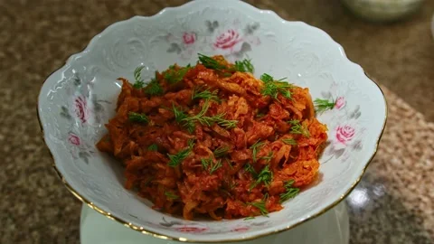 Stewed cabbage with herbs, play with light, presentation Stock Footage 153807233