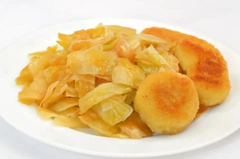Stewed cabbage with nuggets Stock Photos